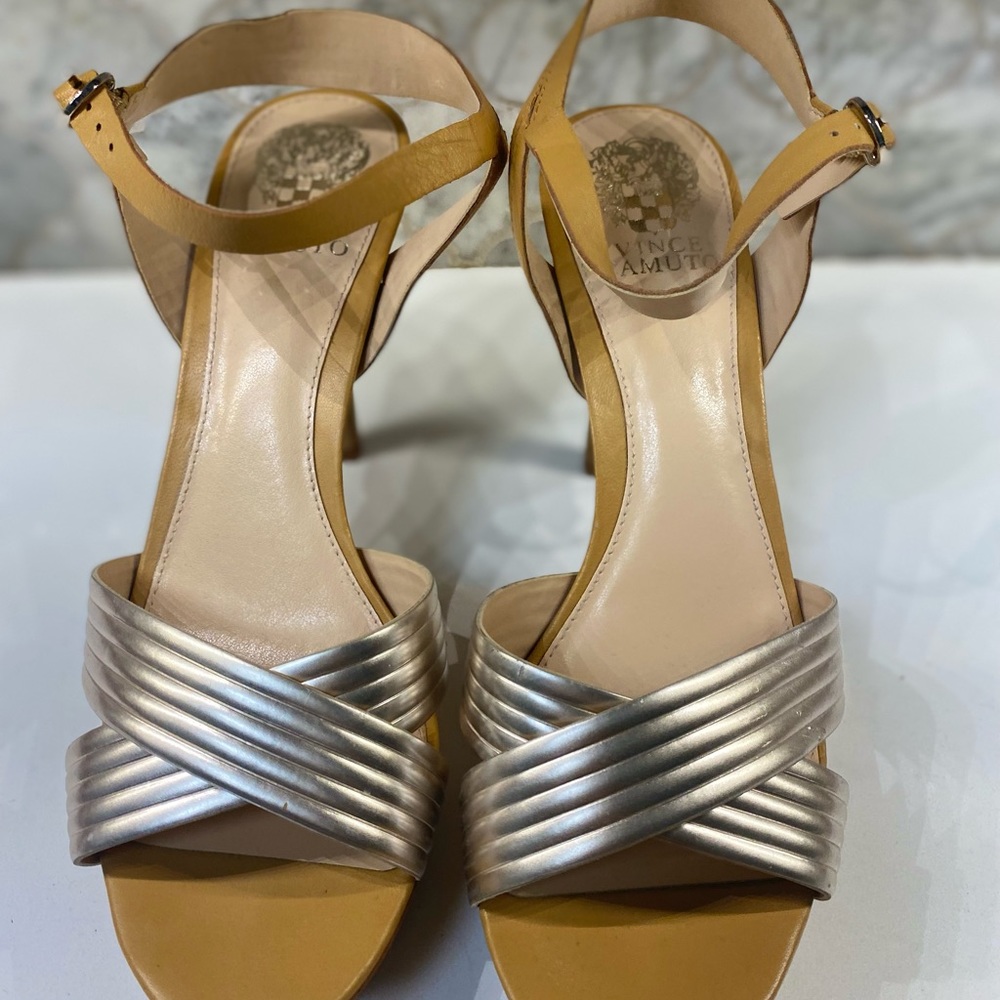 Vince Camuto Woman’s heel in metallic.